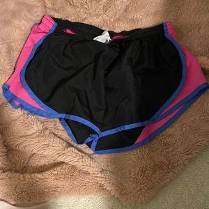 black, pink, and blue soffe juniors medium shorts !!